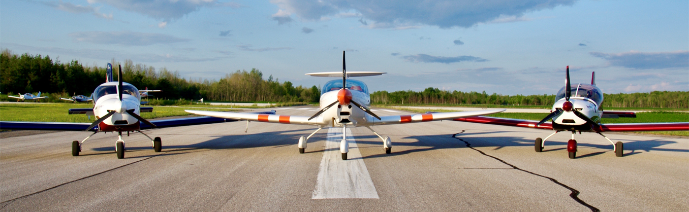 Three planes on runway - ellipse Aviation