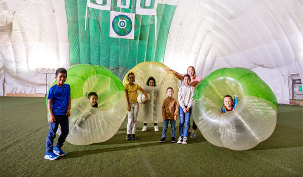 Kids playing with inflatable toys