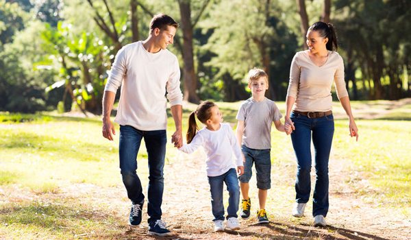 Family walking on trail
