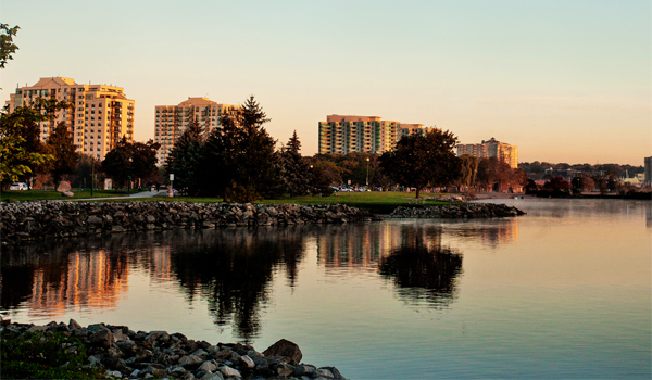Lake with buildings in the background