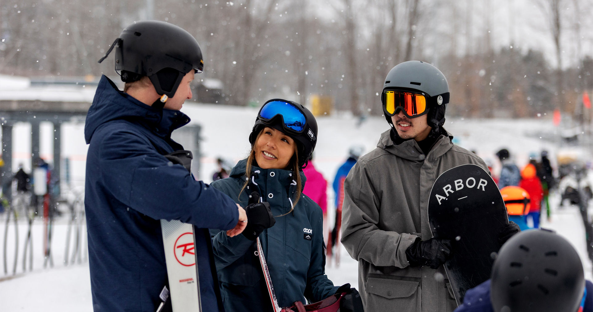 People skiing and snowboarding