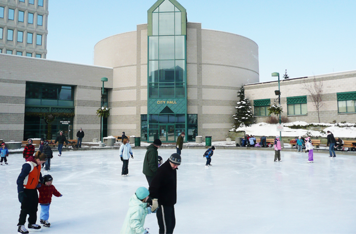 Skating at City Hall Families skating in front of City Hall