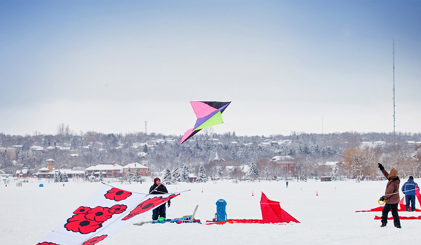 Winterfest Kites people flying kites on kempenfelt bay