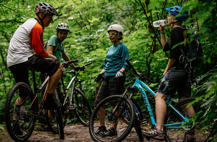 bikeland-group-forest group of bikers in forest