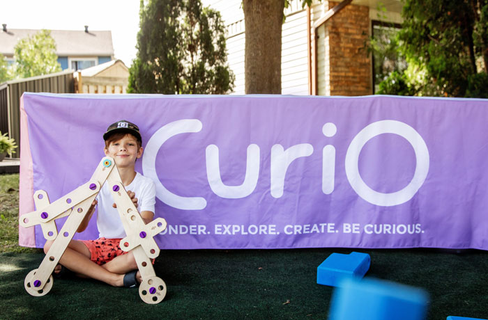 Little boy enjoying Curio play