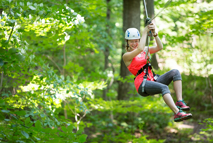 treetop-4 girl ziplining through trees
