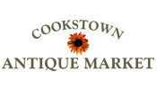 Cookstown Antique Market logo, brown text on white background with flower in the centre