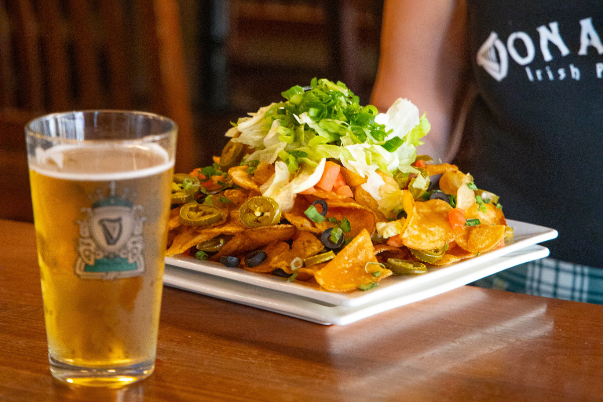 Nachos and glass of beer made at Donaleigh's Irish Public House