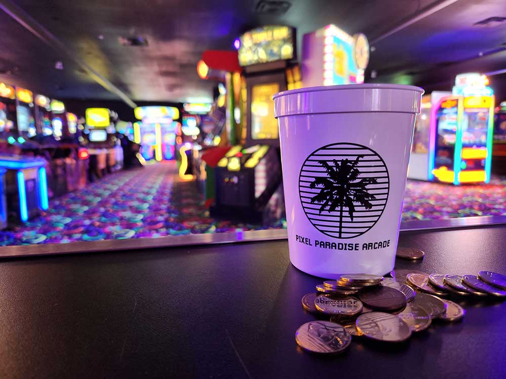 Arcade games and tokens at Pixel Paradise in Barrie