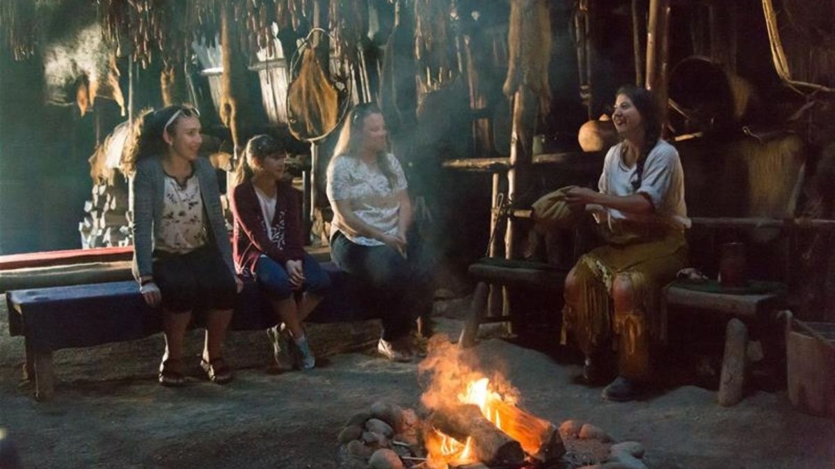 Sainte Marie Among the Hurons visitors in a long house