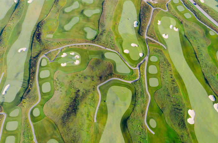 Aerial view of The Nest golf course at Friday Harbour showing fairways and greens side by side