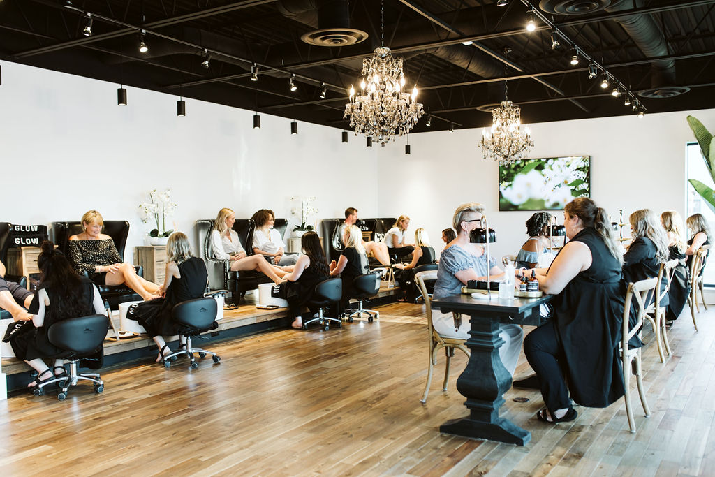 women getting manicures and pedicures at glow day spa